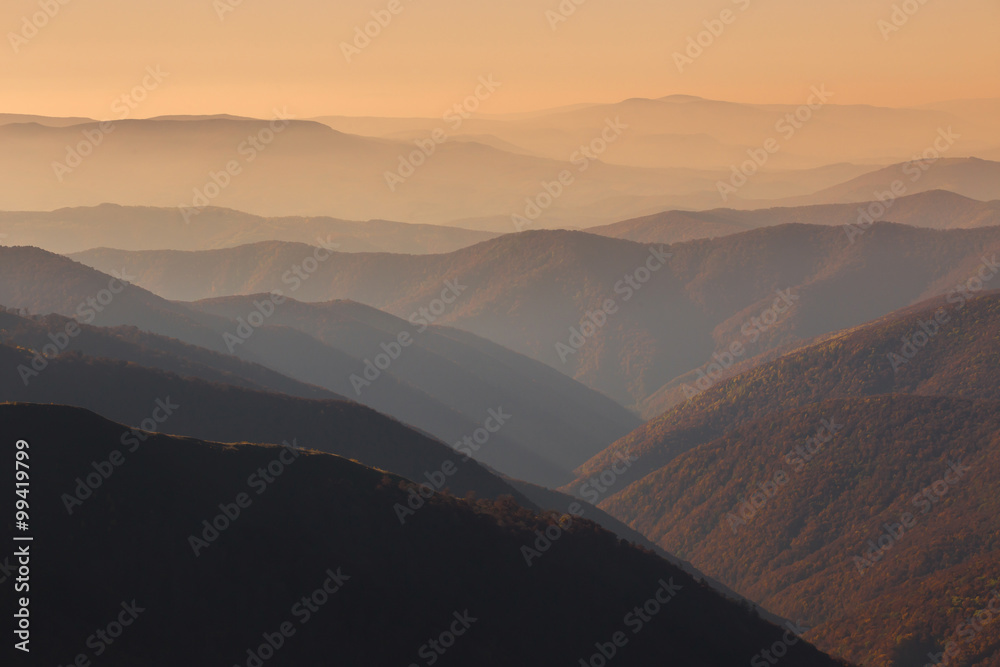 Beautiful sunset in the mountains in orange tones