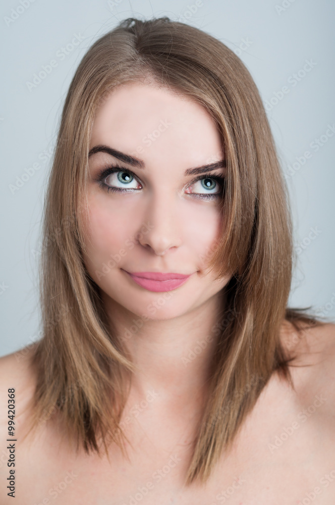 Perfect skin and arrogant female model looking up Perfect skin and arrogant female model looking up