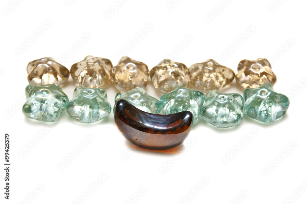 A number of colored glass pieces on a white background A number of colored glass pieces on a white background