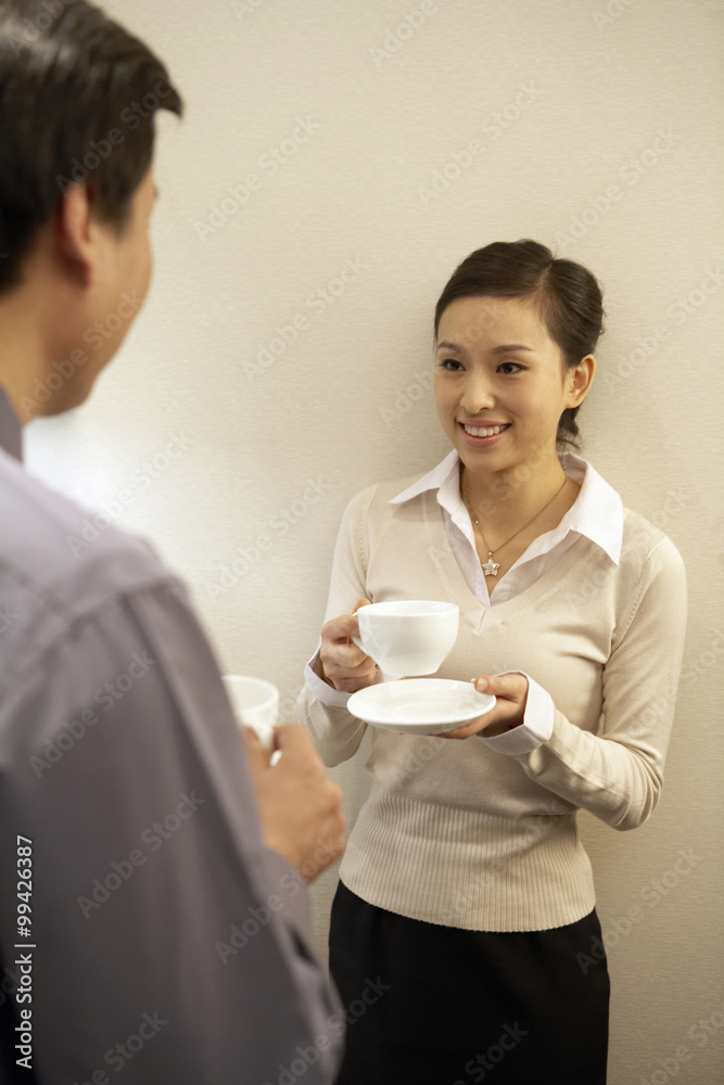 Young Office Workers On A Coffee Break Young Office Workers On A Coffee Break