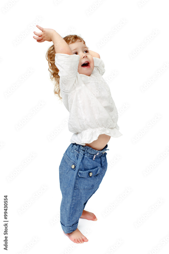 Young baby standing indoors applauding and smiling Young baby standing indoors applauding and smiling
