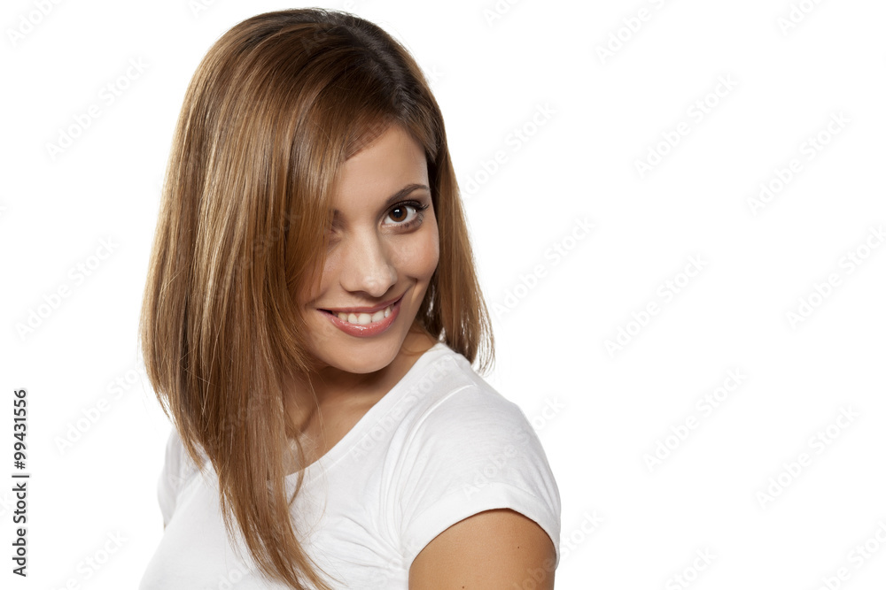 happy young woman smiling on a white background happy young woman smiling on a white background