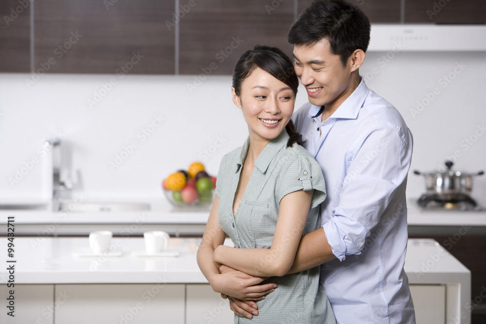 Portrait of a couple in the kitchen Portrait of a couple in the kitchen