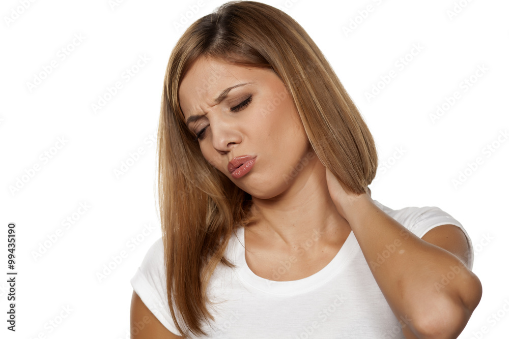 beautiful young woman has a pain in the neck