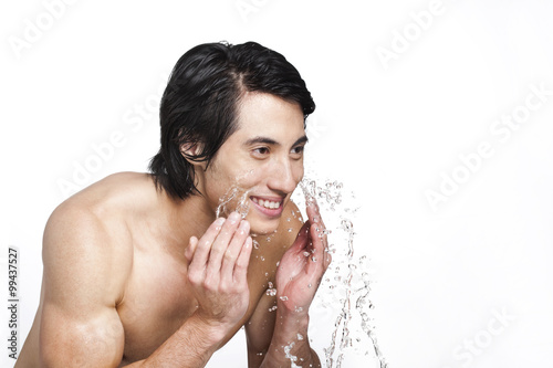 Handsome Man Washing Face