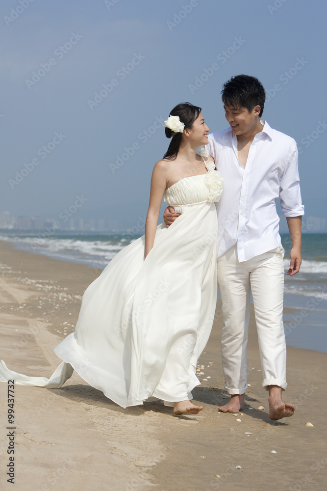 Happy newlyweds on the beach Happy newlyweds on the beach