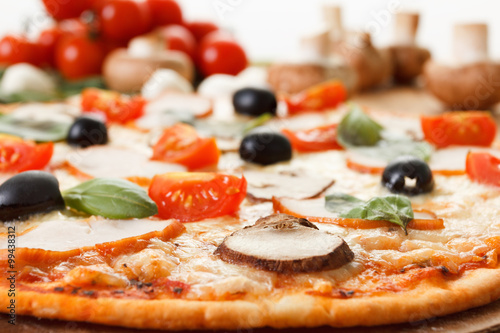 Pizza with mushrooms and ve...
