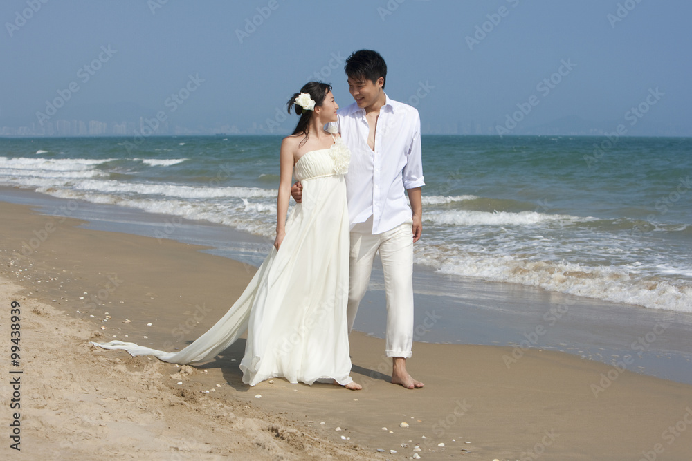 Happy newlyweds on the beach Happy newlyweds on the beach