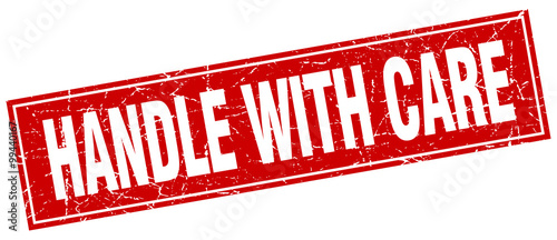 handle with care red square grunge stamp on white