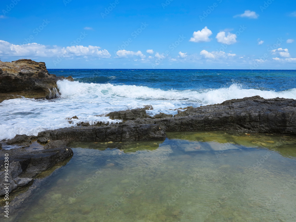Big waves on rock coast blue sea and sky on Crete Big waves on rock coast blue sea and sky on Crete