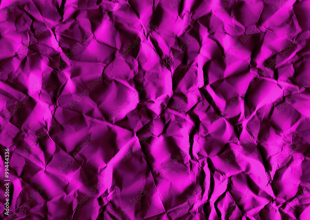 Crinkled rose red colour paper in close up Crinkled rose red colour paper in close up