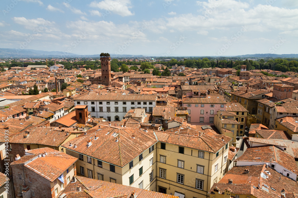 Skyline of the city of Lucca, Italy. Seen from the Torre delle ore towards the Guinigi tower