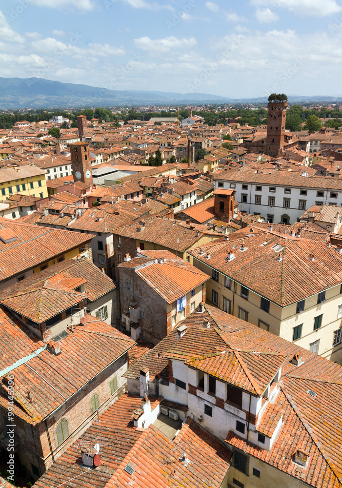 Skyline of the city of Lucca, Italy. Seen from the Torre delle ore towards the Guinigi tower