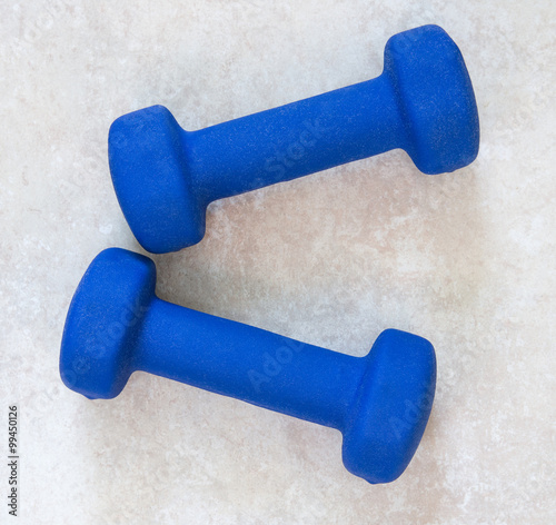Blue dumbbells with a soft coating