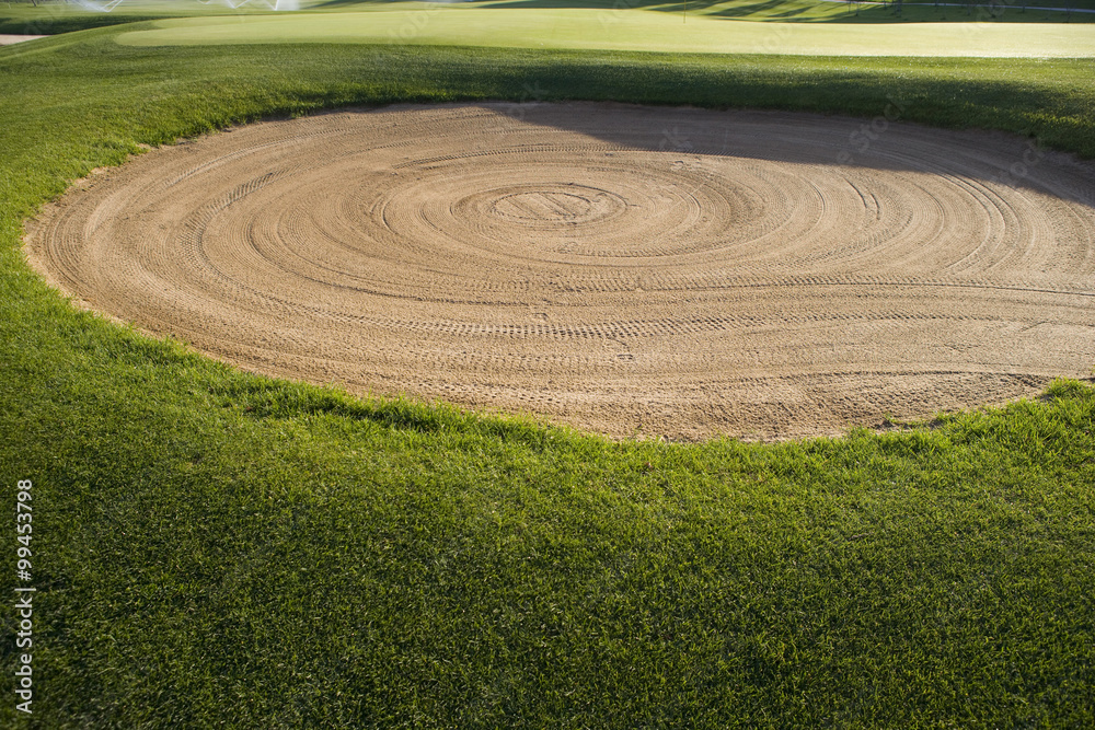Sand trap on the golf course Sand trap on the golf course