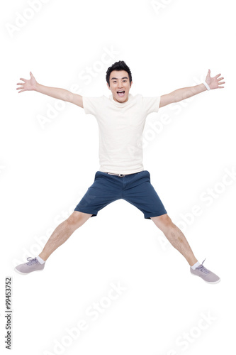 Cheerful young man jumping