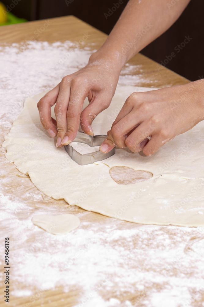hands preparing cookies with dough hands preparing cookies with dough