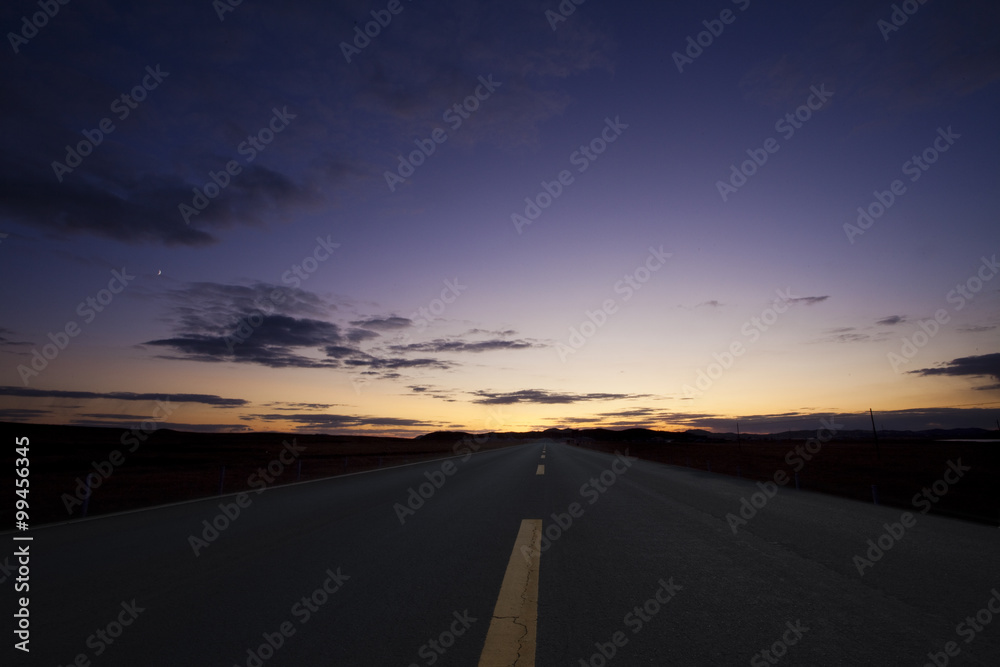 Fototapeta premium Sunset by a highway