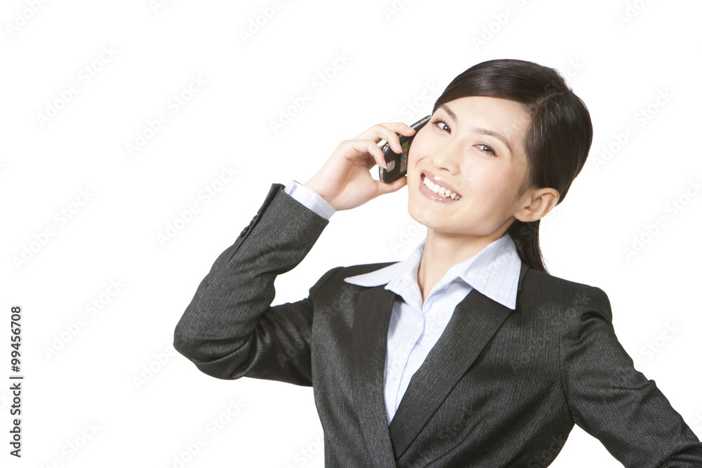 Young businesswoman using mobile phone Young businesswoman using mobile phone