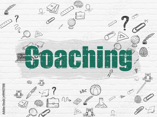 Education concept: Coaching on wall background