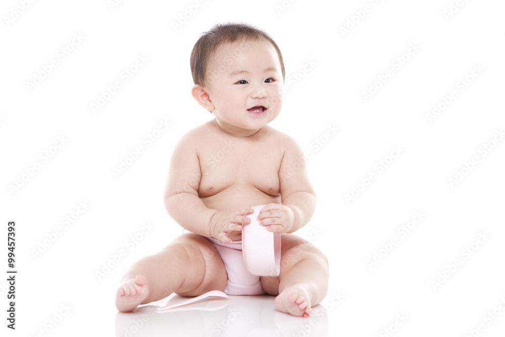 Cute baby with lunch box and spoon Cute baby with lunch box and spoon