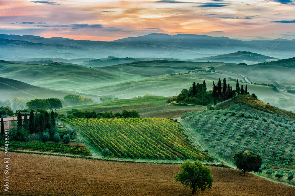 A moody October dawn in San Quirico d'Orcia, Tuscany, Italy