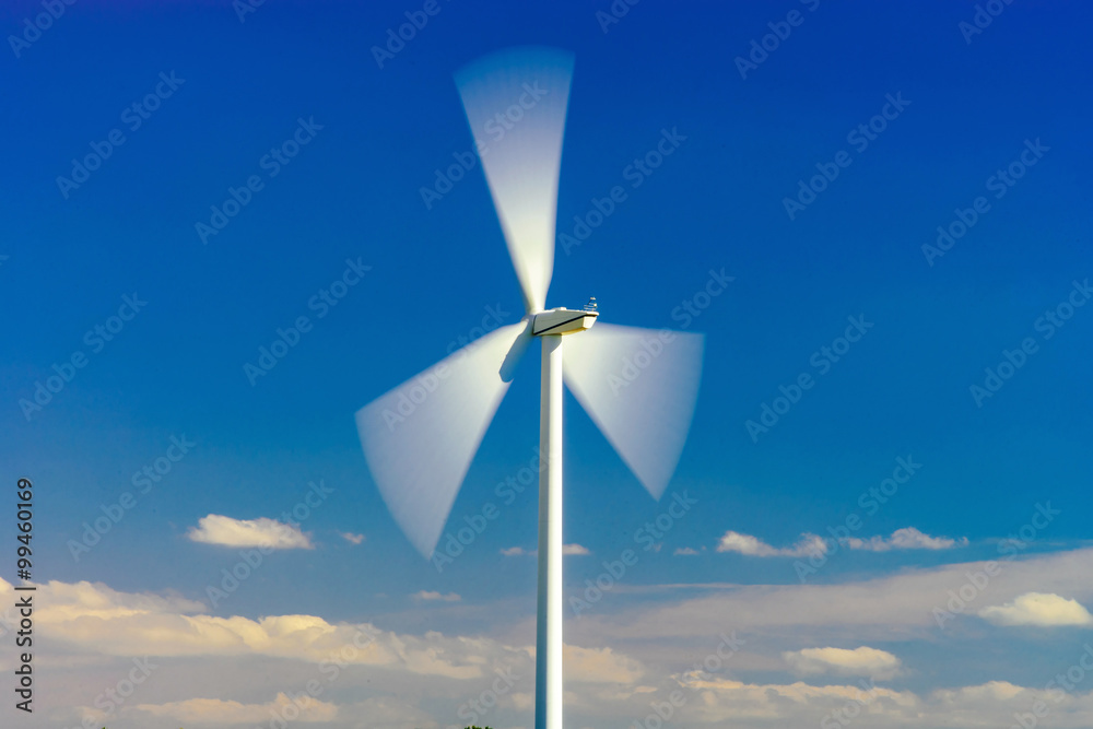 Wind turbines generating electricity in windfarm Wind turbines generating electricity in windfarm