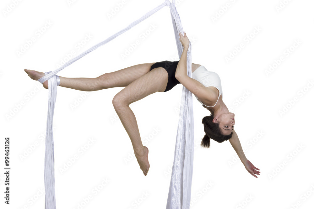Athletic woman doing some tricks on silks Athletic woman doing some tricks on silks