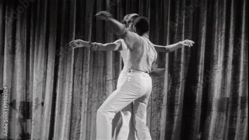 Young couple performing ritual dance, 1960s
