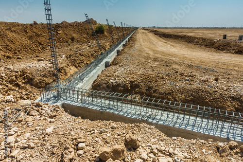Foundation steel bars in Iraqi desert photo