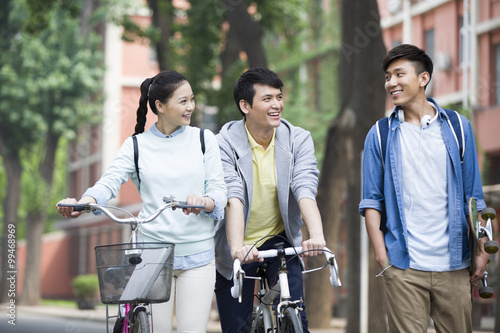 Happy college students on campus photo