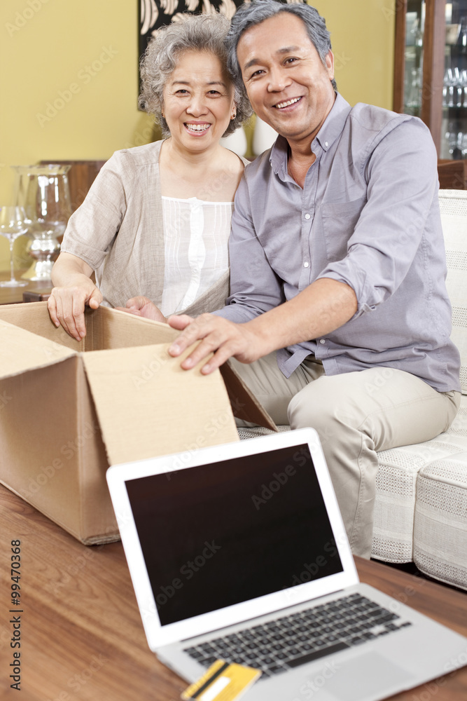 Senior couple receiving their online purchase Senior couple receiving their online purchase