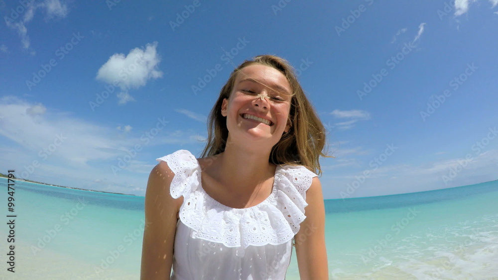 Selfie portrait of female Caucasian teenager with a starfish Selfie portrait of female Caucasian teenager with a starfish
