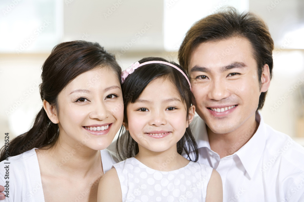Portrait of a young family at home Portrait of a young family at home