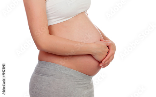 Pregnant woman stroking her belly i © Gelpi