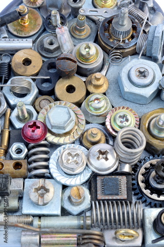 Large collection of various metal elements as screws, bolts, heads, nuts.....