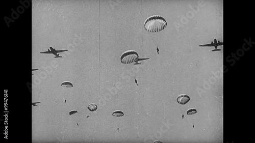 Paratroopers jumping from plane, 1940s