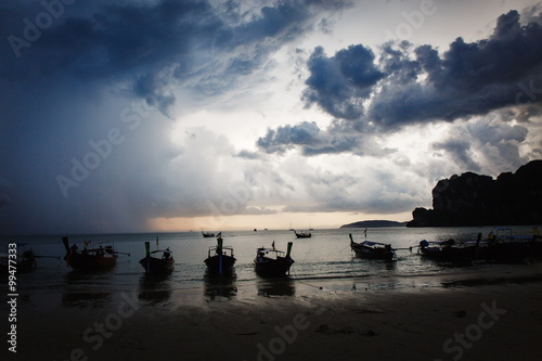 Dramatic sky over the rocky beach © gorov