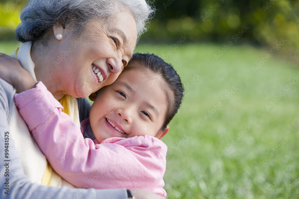 A grandmother and granddaughter share a special moment A grandmother and granddaughter share a special moment