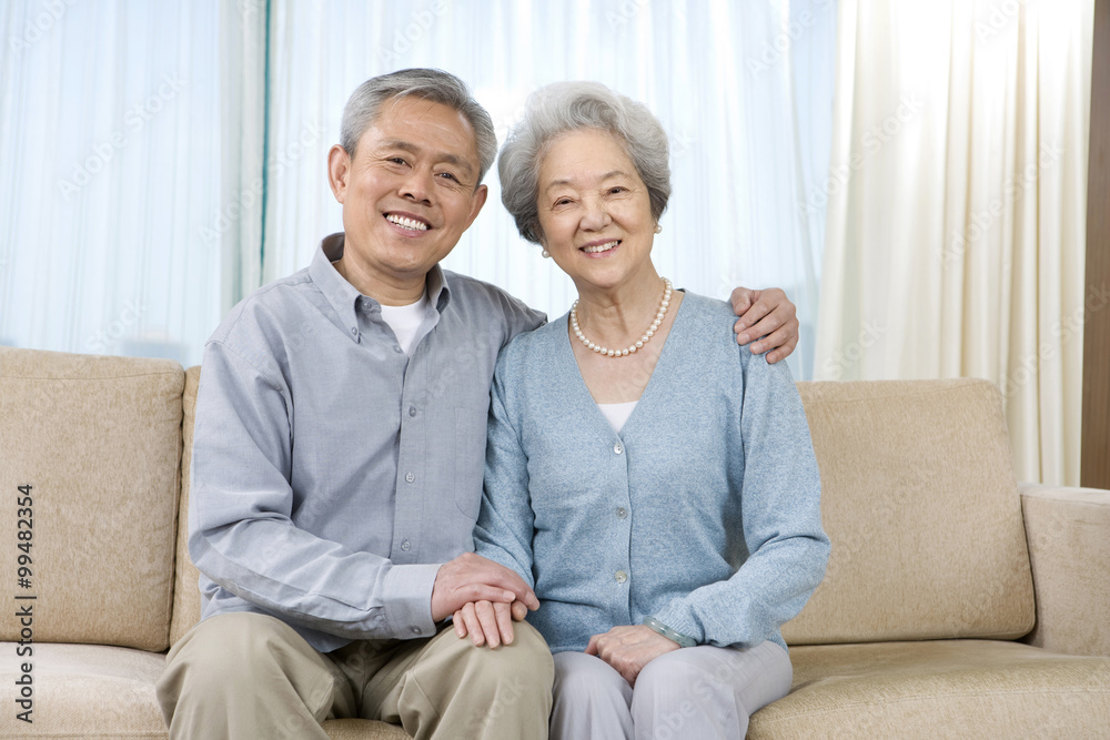 Elderly couple on couch