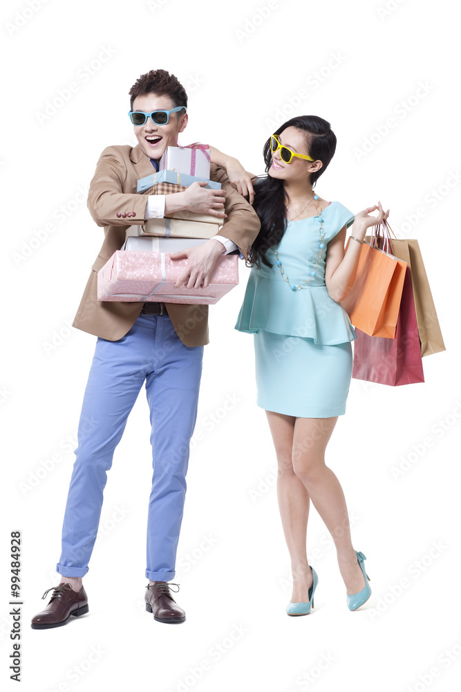 Trendy young couple with cool sunglasses shopping Trendy young couple with cool sunglasses shopping
