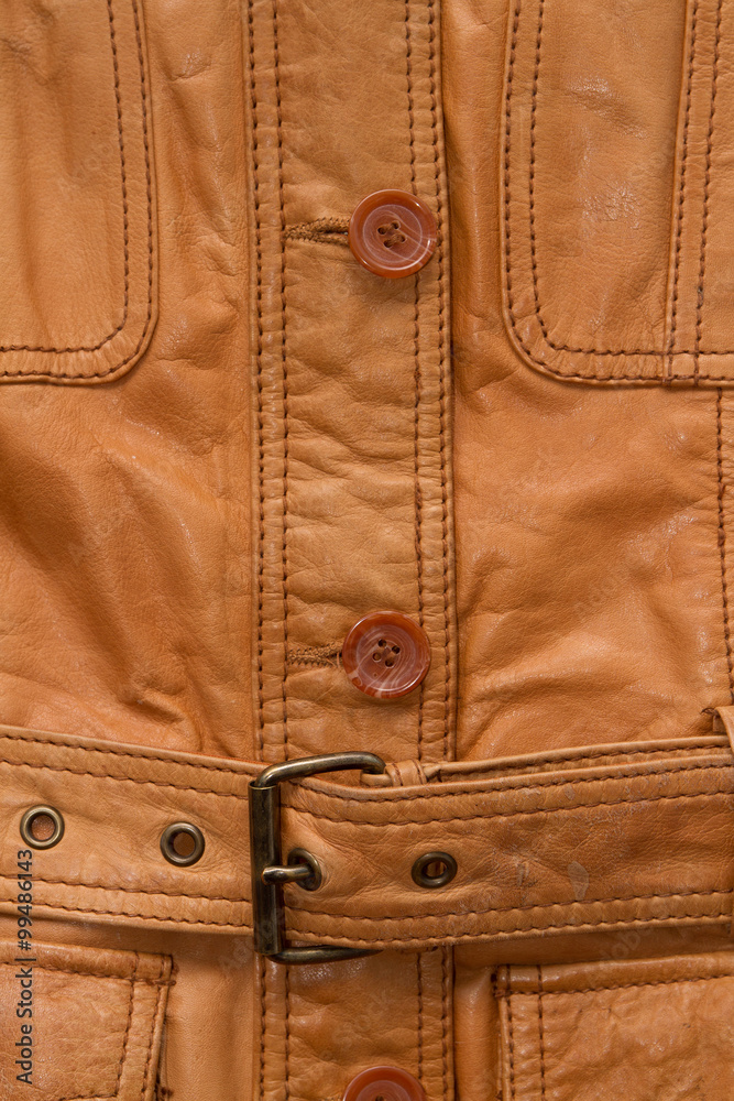 Texture a shabby brown leather jacket.