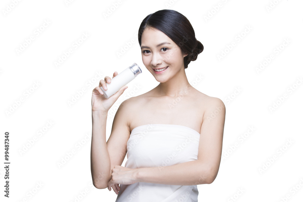 Beautiful young woman with cosmetic product Beautiful young woman with cosmetic product
