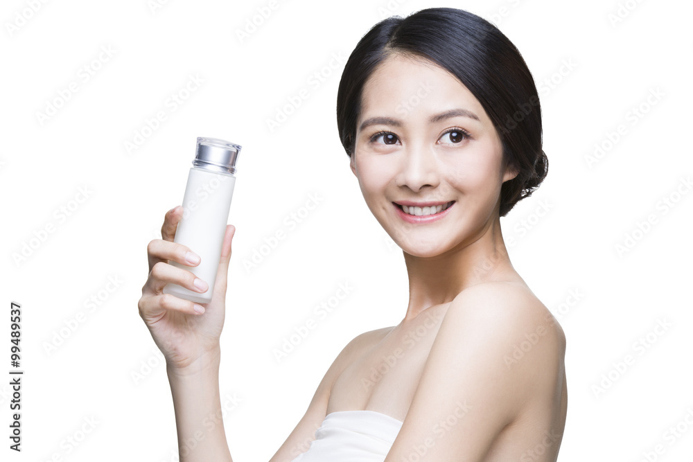 Beautiful young woman with cosmetic product Beautiful young woman with cosmetic product