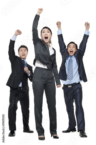 A team of businesspeople cheering