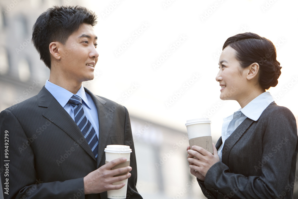 Two business colleagues having a conversation Two business colleagues having a conversation