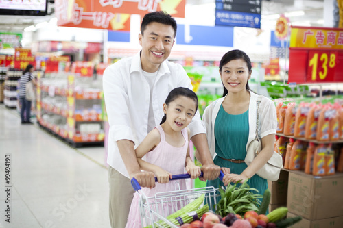 Family shopping in supermarket
