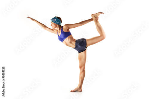 Fototapeta Naklejka Na Ścianę i Meble -  beautiful young girl engaged in yoga, gymnastics, fitness