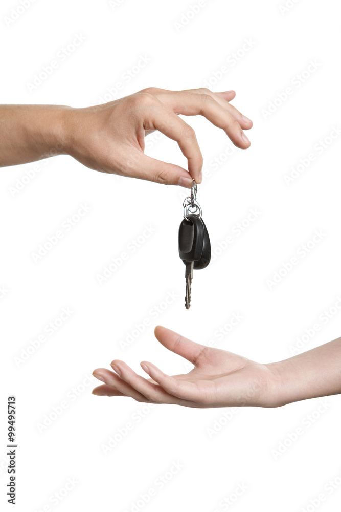 Hands passing keys Hands passing keys