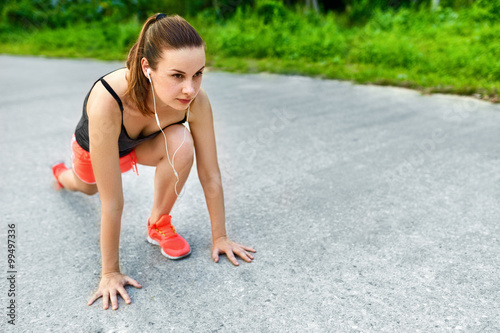 Fitness. Young Fit Woman Jogger Stretching Legs, Preparing To Run. Fit Female Athlete Exercising Before Running. Sports, Exercising, Healthy Lifestyle